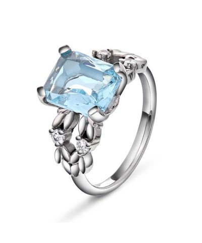 Ring i gull med CZ aqua/hvit