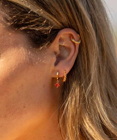 Alternative view of Øreringer i sølv med orange zirkonia