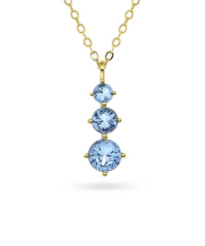 Smykke i sølv med aqua-blå zirkonia