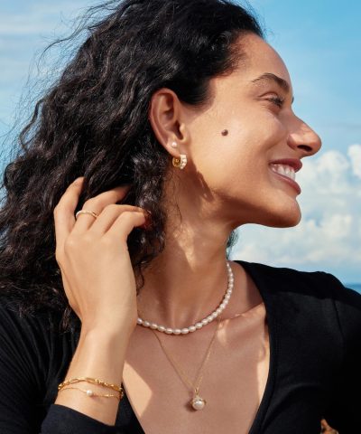 Alternative view of Ania Haie Gold Sparkling Shell Pearl Row Huggie Hoop Earrings